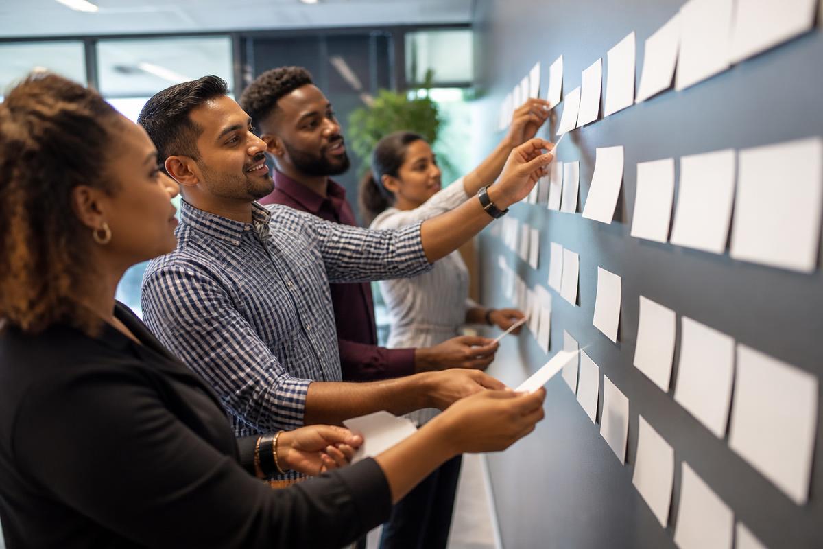 Caribbean professionals at work on process re-engineering opportunities for UNVEIL