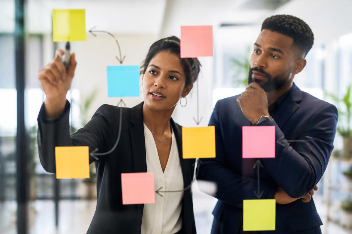 Caribbean professionals at work on cause-and-effect analysis for UNVEIL
