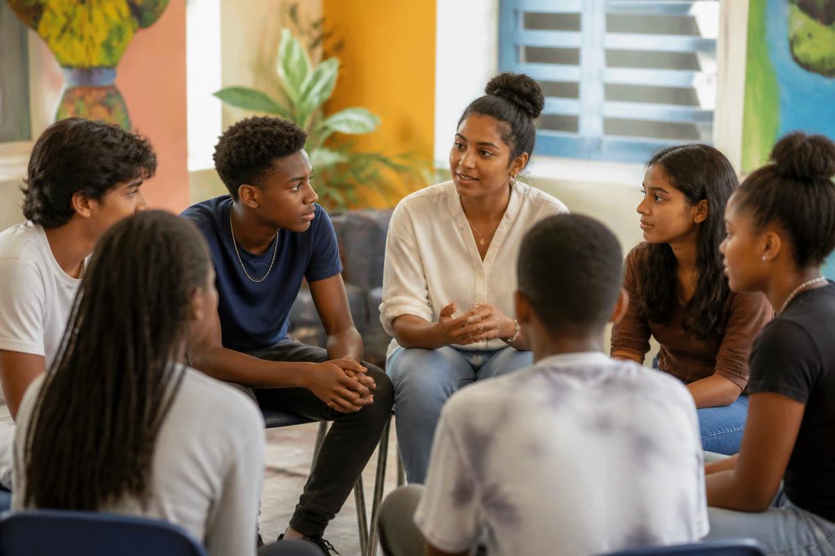 Afro-Caribbean and Indo-Caribbean teenagers in a peer discussion group with a youth mentor